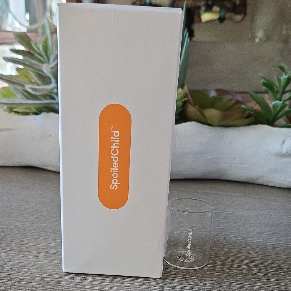 SpoiledChild Baby Product in White with Orange Accent